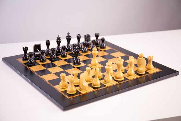 Vintage wooden chess set with queen gambit opening, close-up view